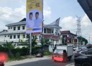 Paslon Bupati Simalungun RHS-AZI Pasang Baliho di Tiang Reklame Tanpa Ijin